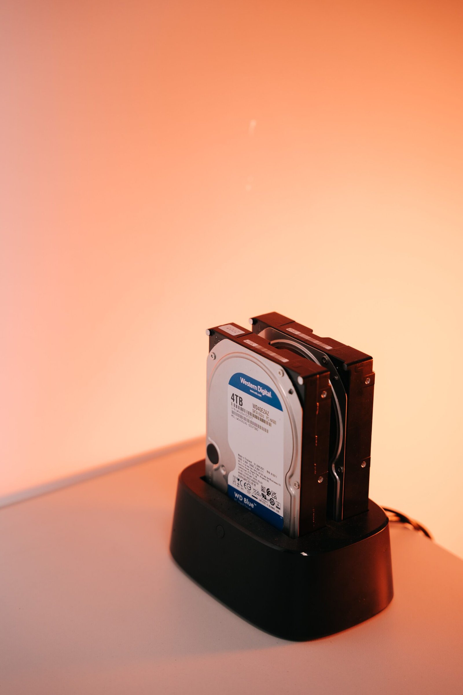 A 4TB Western Digital hard drive on a docking station for NVR storage